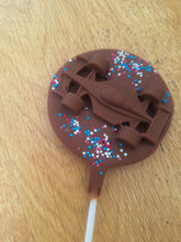 Load image into Gallery viewer, Racing Race Milk chocolate lolly
